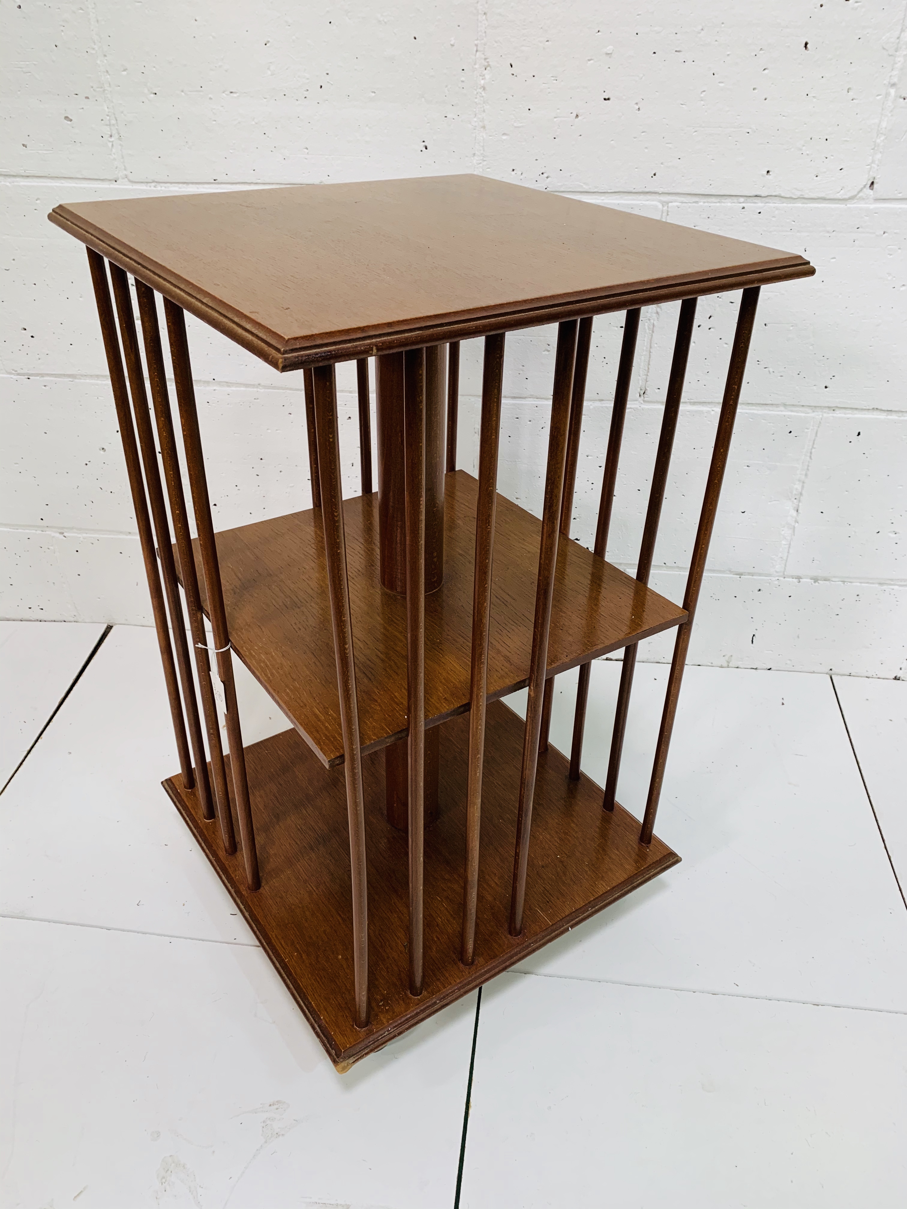 Mahogany revolving two tier bookcase on casters. - Image 2 of 2