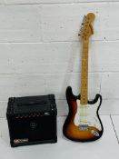 Starcaster Fender electric guitar, case and amp.