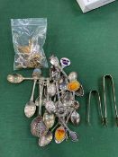 19 collectable teaspoons and a bag of fashion cufflinks