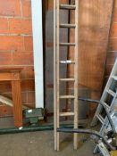 Wooden double extending ladder.