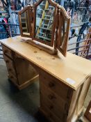 Pine dressing table together with pine framed mirror