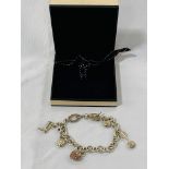 Links of London 925 silver charm bracelet with charms in box.