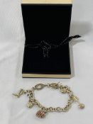 Links of London 925 silver charm bracelet with charms in box.