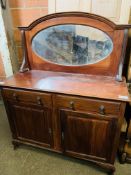 Mahogany mirrored sideboard with two frieze drawers over two cupboards.