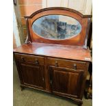 Mahogany mirrored sideboard with two frieze drawers over two cupboards.