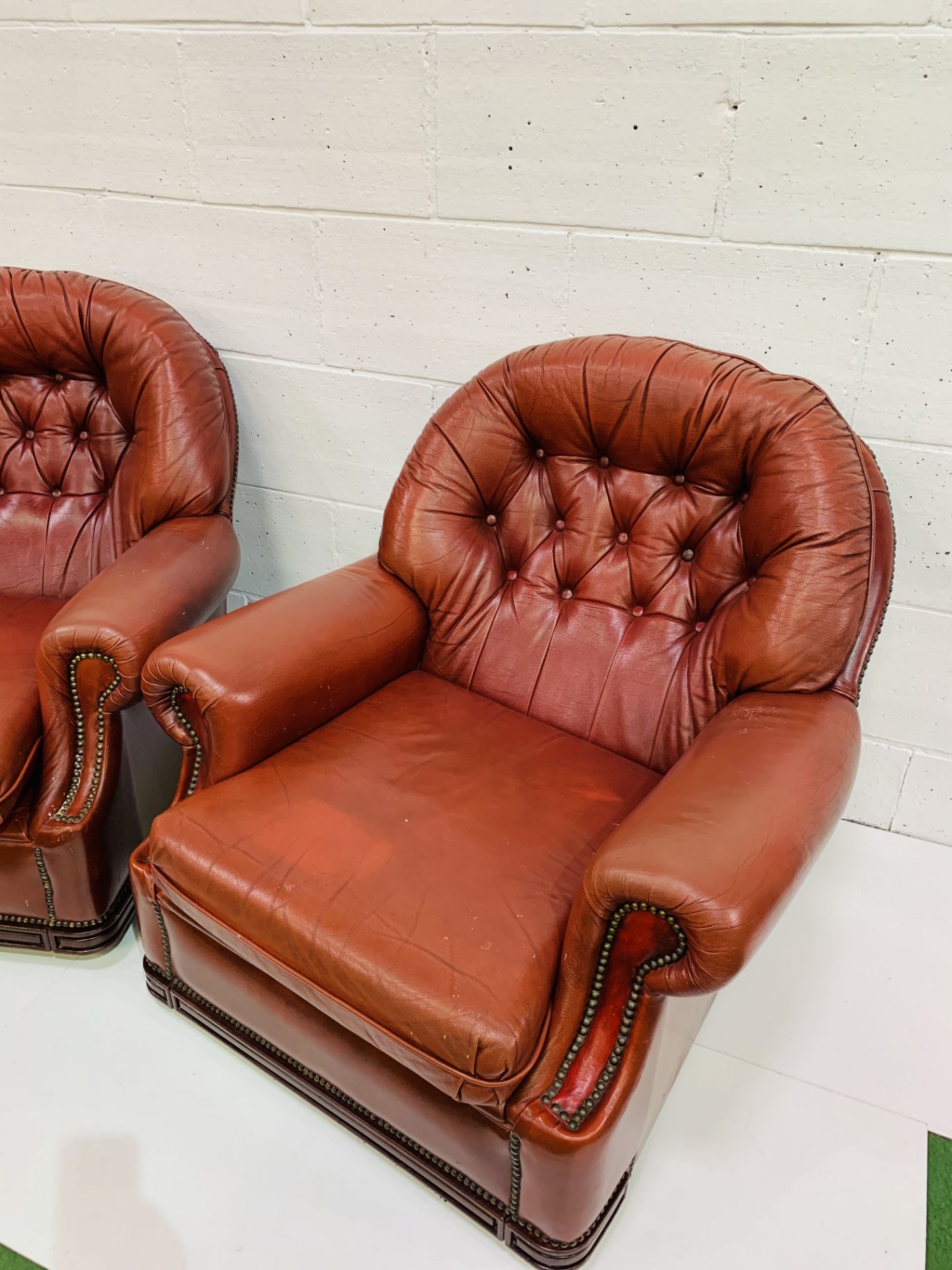 Pair of button back red leather arm chairs with studded trim to arms and back. - Image 4 of 4