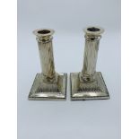 Pair of silver plated candlesticks