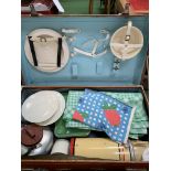1950's picnic hamper, thermos, plates and cups.
