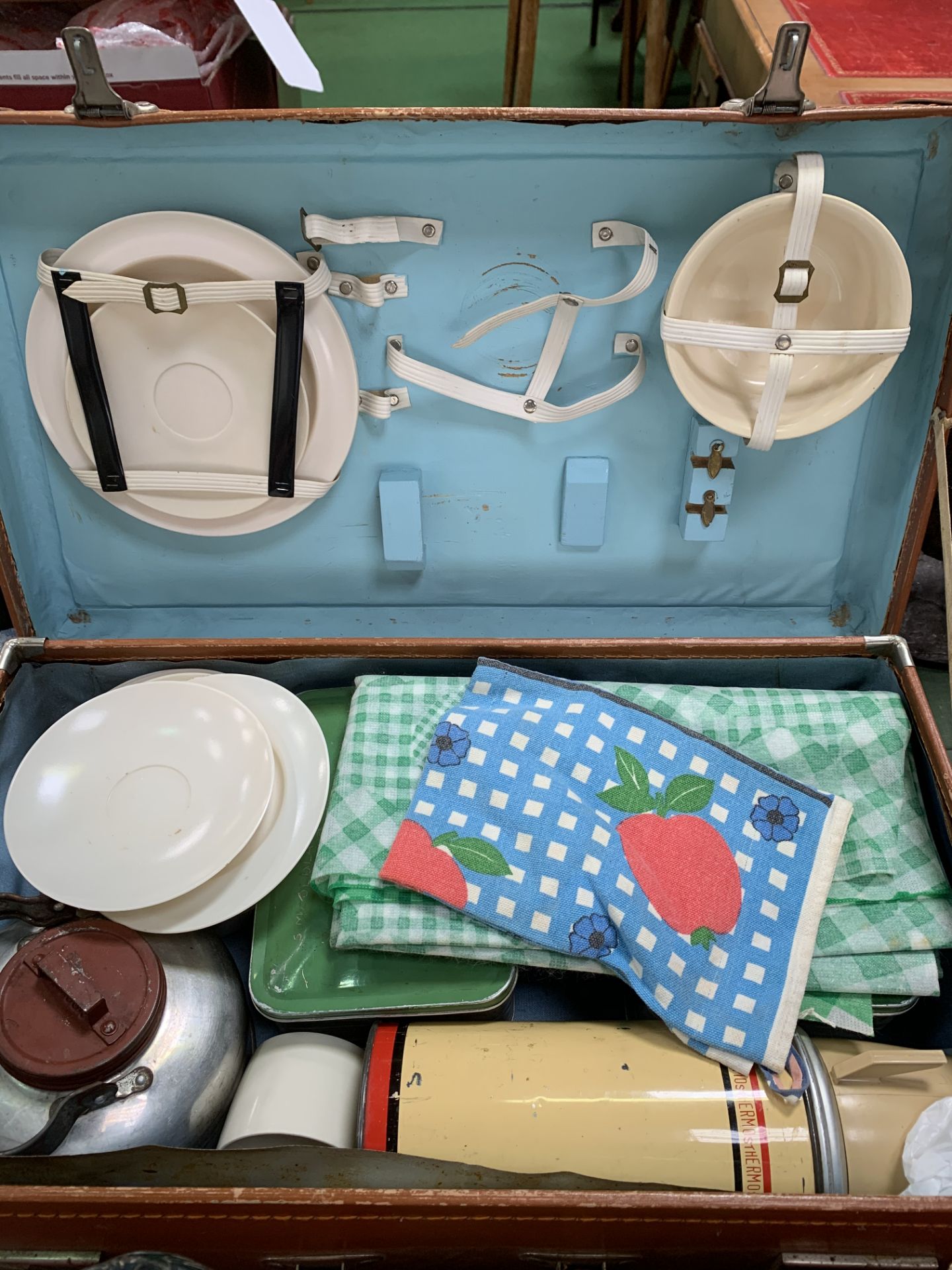 1950's picnic hamper, thermos, plates and cups.