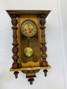 Viennese mahogany case pendulum wall clock, complete with key.