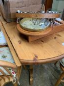 Circular drop-leaf pine kitchen table; 4 Windsor chairs; a circular utensil hanger and a pine cased