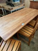 Pine table on end supports with centre stretcher, plus 4 matching chairs.