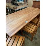 Pine table on end supports with centre stretcher, plus 4 matching chairs.