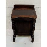 Mahogany Davenport with carved legs, top box and internal drawers.