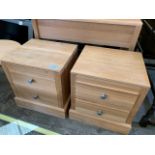 Pair of light oak Alexander Furniture bedside cabinets with 2 drawers