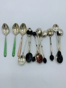 14 silver tea/coffee spoons.