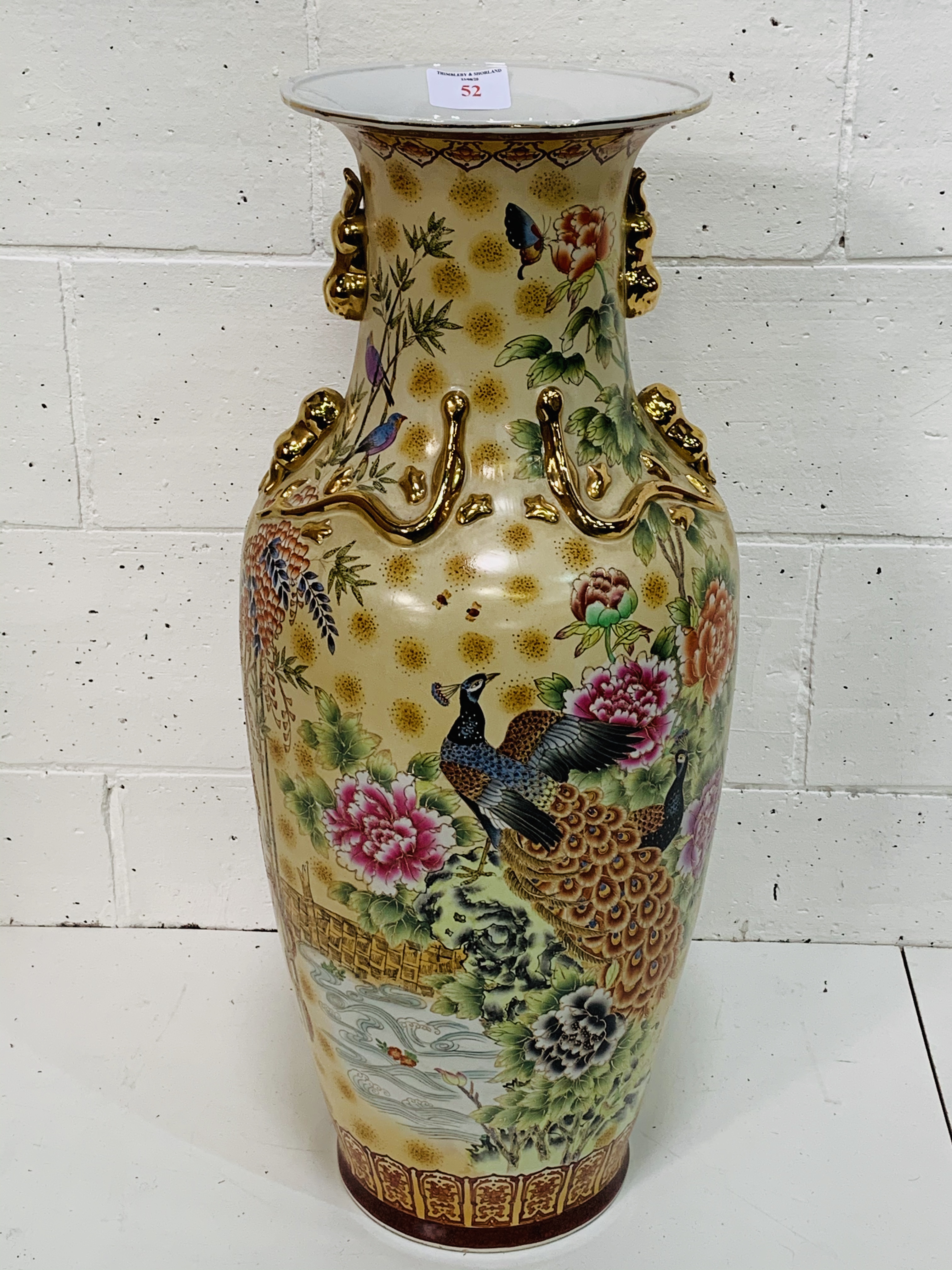 Large hand painted Chinese vase depicting birds and flowers.