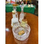 Two glass decanters; a Bell's Whisky decanter; a Bell's Whisky porcelain decanter; a glass bowl