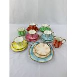 Five Taylor and Kent cup, saucer and plate triptyches; plus 5 other items.