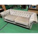 Kirkdale furntiture Chesterfield style large two seater sofa upholsterd in taupe fabric with a butto