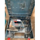 Bosch GST135BCE jigsaw in a plastic case.