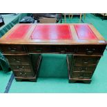 Mahogany pedestal desk with red leather skivers, three drawers to one pedestal and a filing cupboard