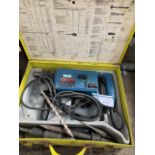 Bosch UBH4-26-2DS hammer drill in metal case.