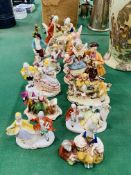 11 continental porcelain figurines, including 2 couples playing board games