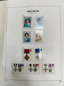 1937-2000 stamp collection in two hingeless SG albums mostly unmarked. Good decimal face value.