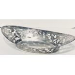 Sterling silver bonbon dish decorated with pierced sides.