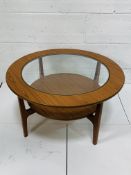 1970's Schreiber glass top circular low table with shelf, 84cms dia.
