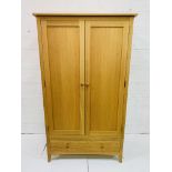 Oak double wardrobe with drawer beneath, 100 x 62 x 190cms.