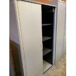 Two metal tambour-fronted cabinets, with interior shelves.