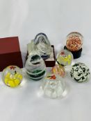 Collection of 9 glass paperweights, including a boxed Royal Crest Sorceress.