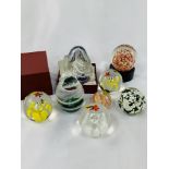 Collection of 9 glass paperweights, including a boxed Royal Crest Sorceress.