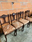 4 Mahogany framed open splat dining chairs.