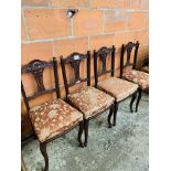 4 Mahogany framed open splat dining chairs.