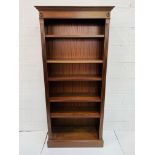 Mahogany open book case of five shelves.