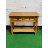 Pine side table with two frieze drawers and display shelf beneath