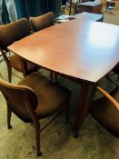 Danish 'Vanson' 1950's extendable teak table together with 3 chairs and 2 carvers.