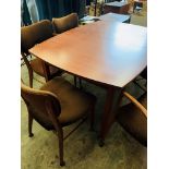 Danish 'Vanson' 1950's extendable teak table together with 3 chairs and 2 carvers.