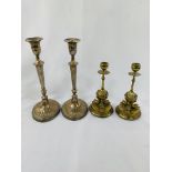 Pair of Walker and Hall silver plate candlesticks and a pair of brass candlesticks