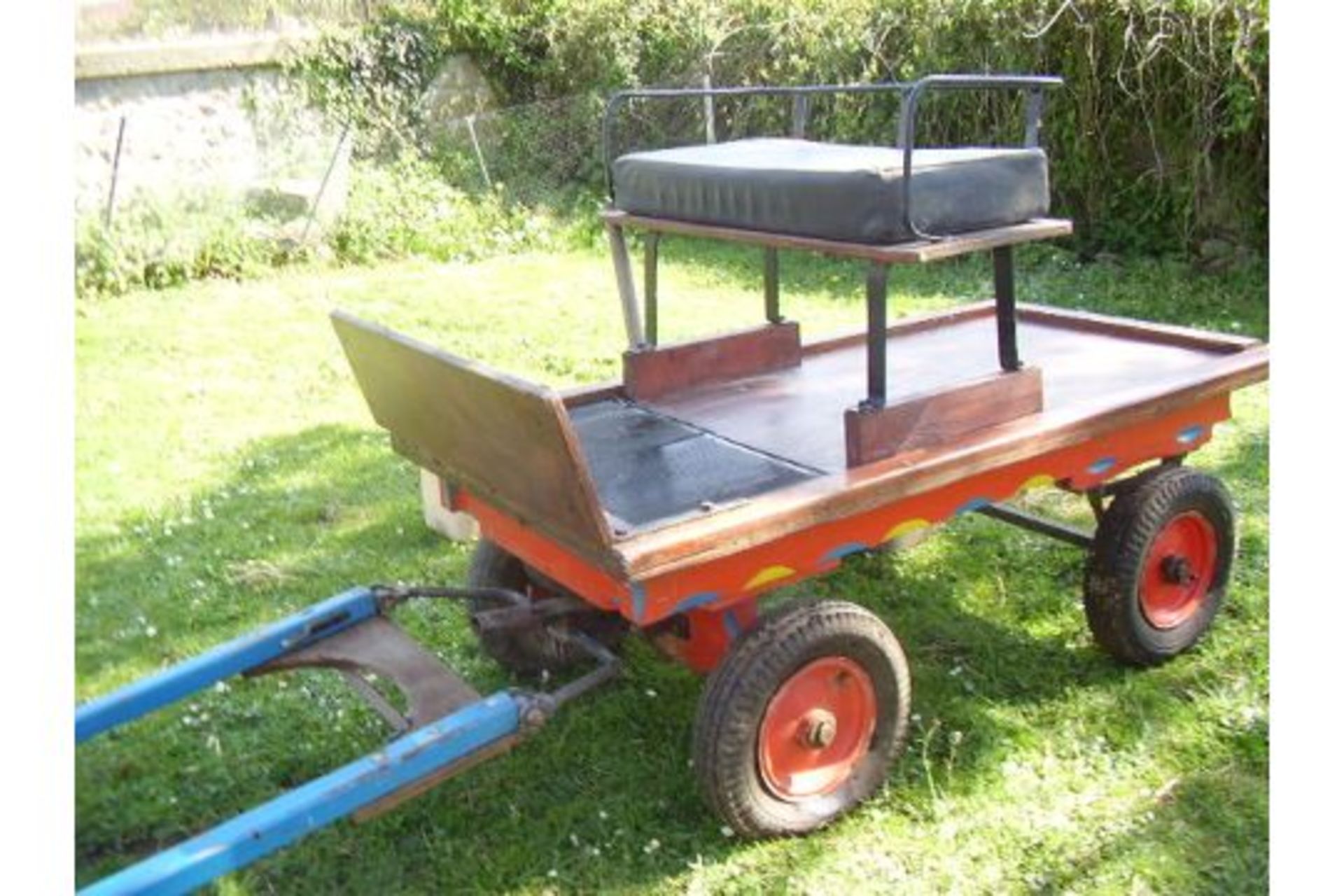 TROLLEY to suit a Shetland pony single or pair. In natural varnished wood with black