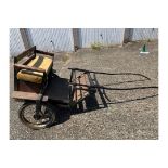 EXERCISE CART to suit 12 to 13.2hh pony. A black painted metal frame, the body in natural varnishe