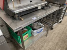 Stainless steel prep table with shelf.