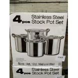 Four piece stainless steel stock pot set.