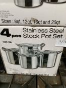 Four piece stainless steel stock pot set.