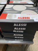 12 x Alessi dinner plates.