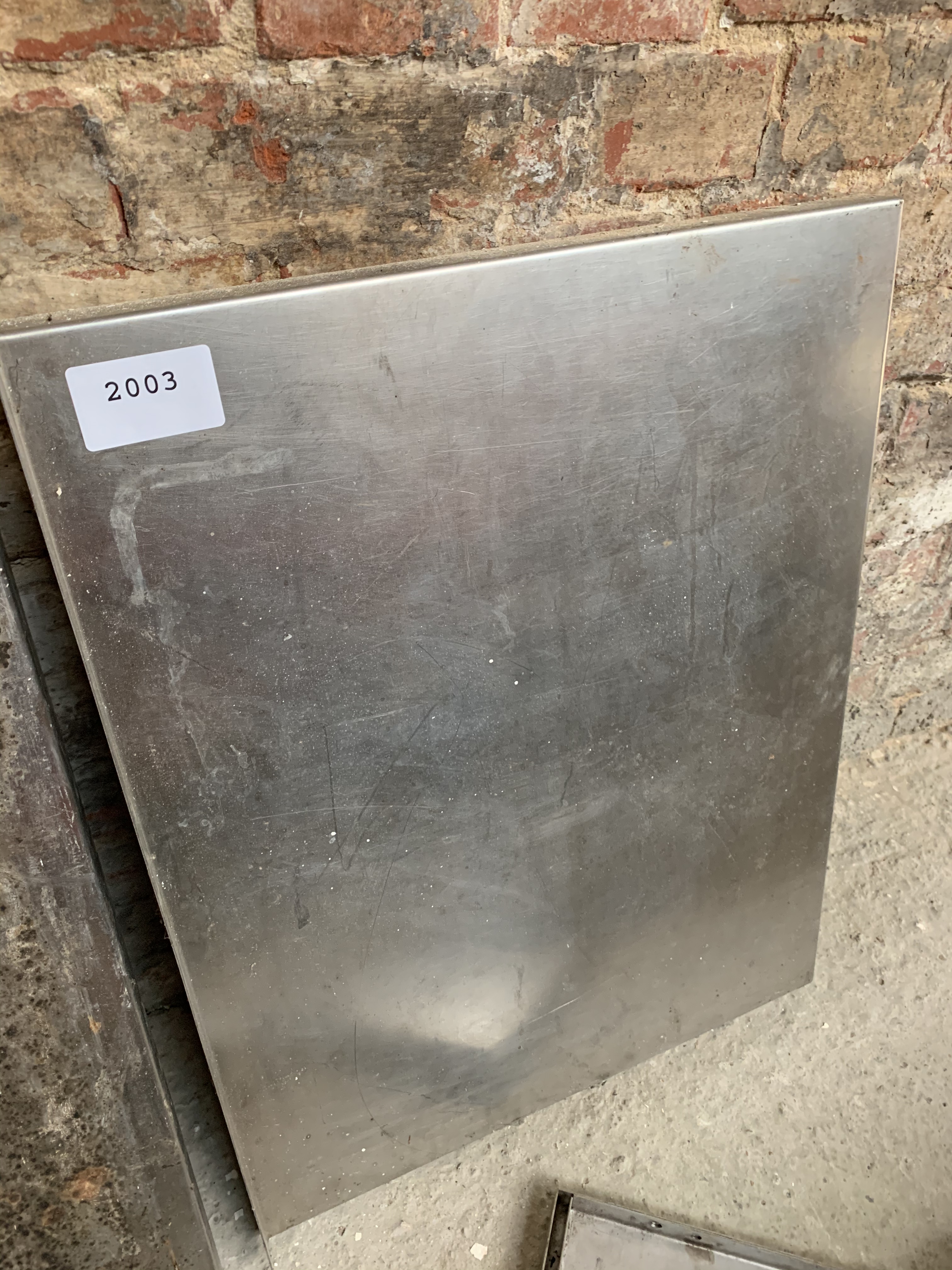 Stainless steel wall shelf, wide.