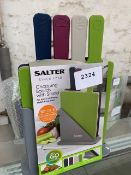 Salter 4 piece set of coloured coded chopping boards in stand.